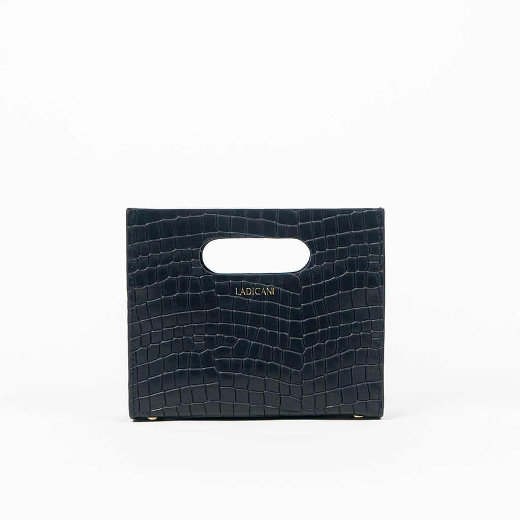 Beige textured cassette bag with a visible brand logo on a white background