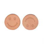 Smiley face leather coasters 