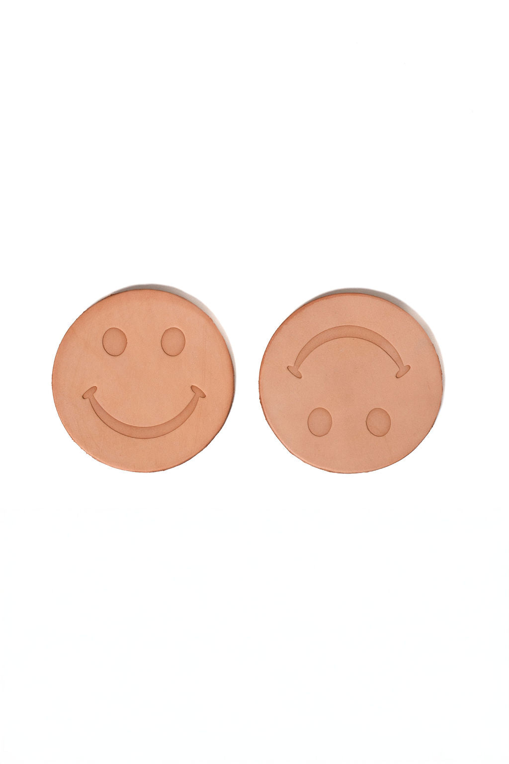Smiley face leather coasters 