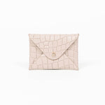 Beige leather cardholder on a white background
