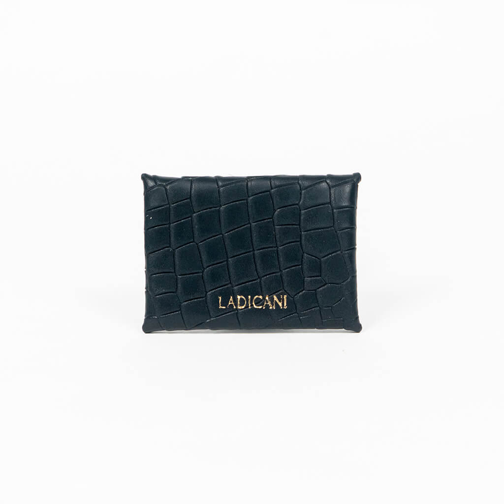 Back of a black leather cardholder on a white background
