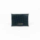 Back of a black leather cardholder on a white background