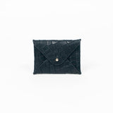 Black leather cardholder on a white background