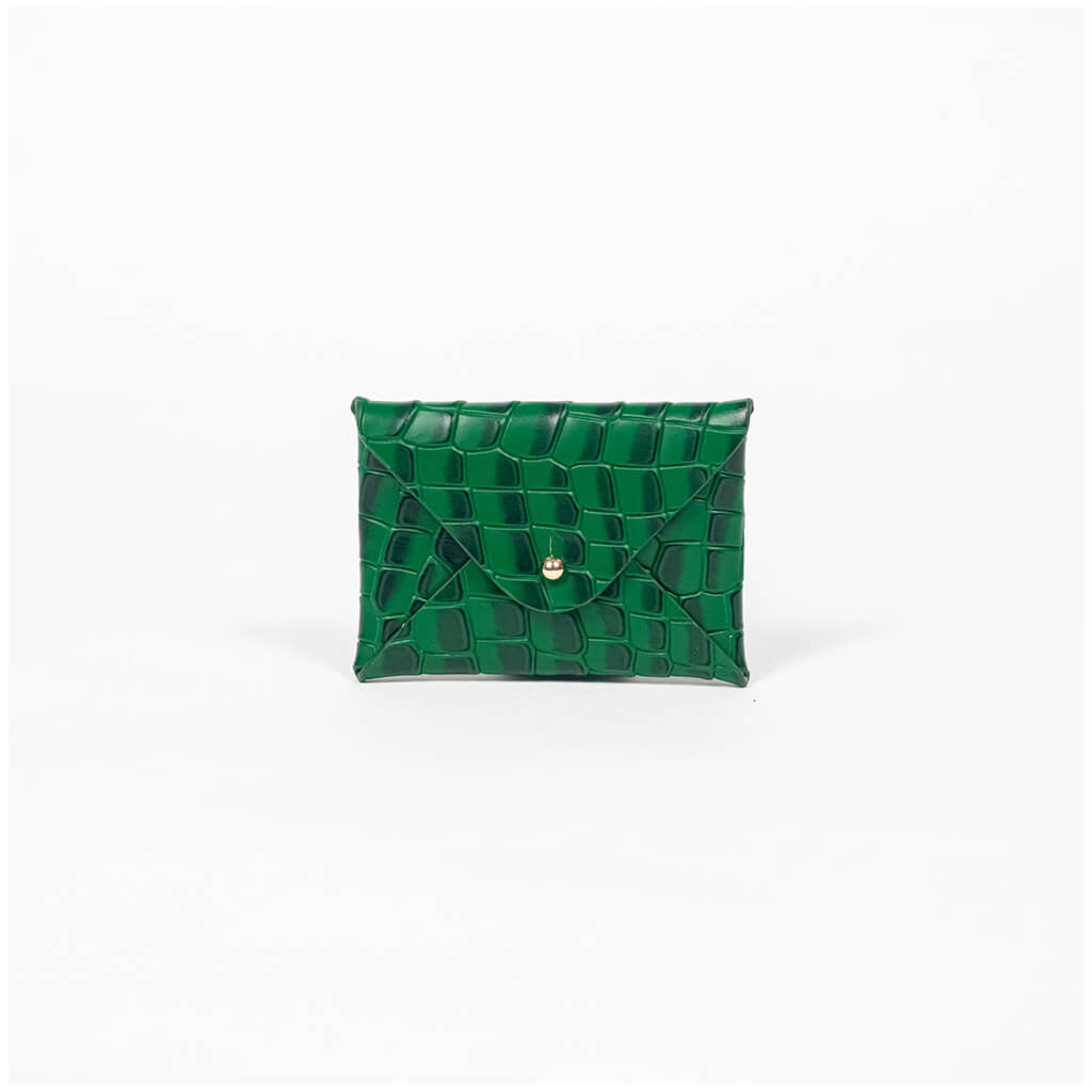Green leather cardholder on a white background