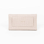 Back of a beige mini clutch bag on a white background