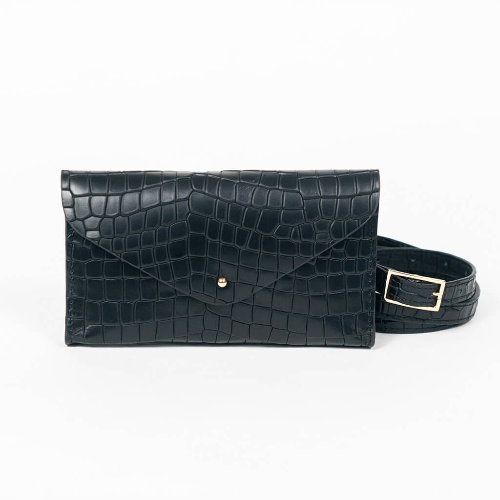 Black mini clutch bag with matching belt on a white background