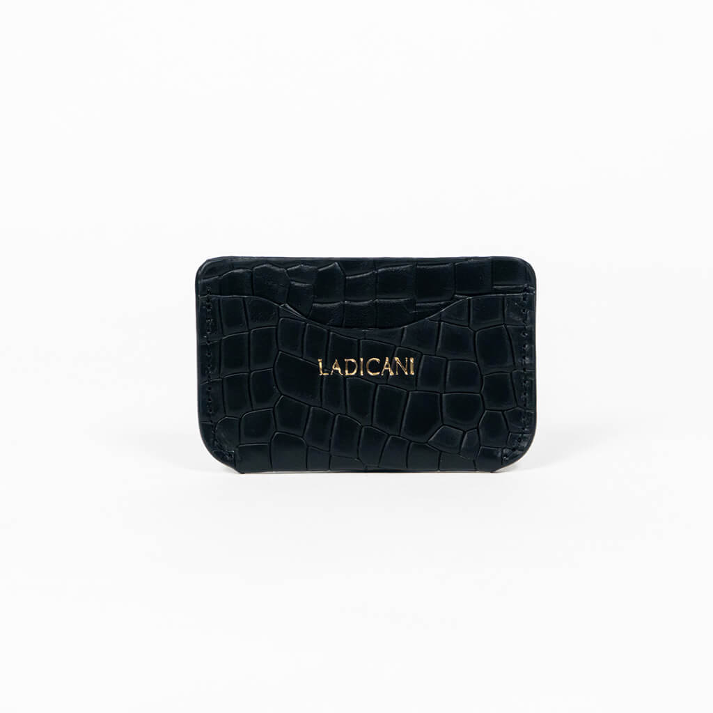 Black leather slim wallet with branding on a white background