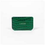 Green leather slim wallet with branding on a white background